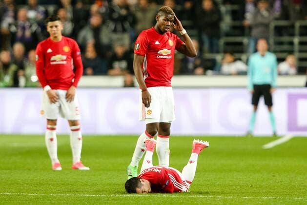 Manchester United ManU s Paul Pogba looks on as Manchester United s Henrikh Mkhitaryan is on the floor post foul during the Europa League Quarter Final 1st leg match at RSCA Constant Vanden Stock Stadium, Anderlecht, Belgium. Picture date: April 13th, 2017.Pic credit should read: Charlie Forgham-Bailey Sportimage EDITORIAL USE ONLY. No use with unauthorised audio, video, data, fixture lists, club league logos or live services. Online in-match use limited to 120 images, no video emulation. No use in betting, games or single club league player publications.