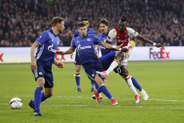 (L-R) Benedikt Howedes of FC Schalke 04, Matija Nastasic of FC Schalke 04, Benjamin Stambouli of FC Schalke 04, Bertrand Traore of Ajaxduring the UEFA Europa League quarter final match between Ajax Amsterdam and FC Schalke 04 at the Amsterdam Arena on April 13, 2017 in Amsterdam, The Netherlands Ajax v FC Schalke 04 UEFA Europa League 2016 2017 xVIxxIVx 7563626