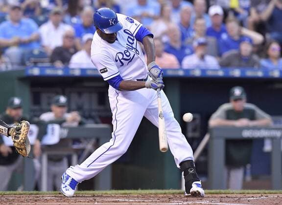 April 13, 2017 - Kansas City, MO, USA - The Kansas City Royals Lorenzo Cain connects on an RBI single in the first inning against the Oakland Athletics at Kauffman Stadium in Kansas City, Mo., on Thursday, April 13, 2017. Oakland at Kansas City - ZUMAm67_ 20170413_zaf_m67_034 Copyright: xJohnxSleezerx