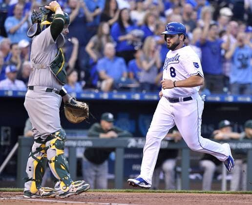 April 13, 2017 - Kansas City, MO, USA - The Kansas City Royals Mike Moustakas (8) scores on a single by Salvador Perez in the first inning against the Oakland Athletics at Kauffman Stadium in Kansas City, Mo., on Thursday, April 13, 2017. Oakland at Kansas City - ZUMAm67_ 20170413_zaf_m67_036 Copyright: xJohnxSleezerx