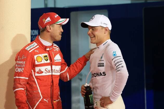 Bahrain Grand Prix, Sakhir 13 - 16 April 2017 15.04.2017 - Qualifying, Sebastian Vettel (GER) Scuderia Ferrari SF70H and Valtteri Bottas (FIN) Mercedes AMG F1 W08 