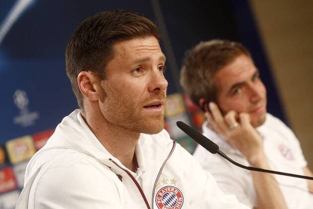 FC Bayern Munchen s Xabi Alonso (l) and Philipp Lahm in press conference PK Pressekonferenz before training session. April 17,2017.  (20170417163)