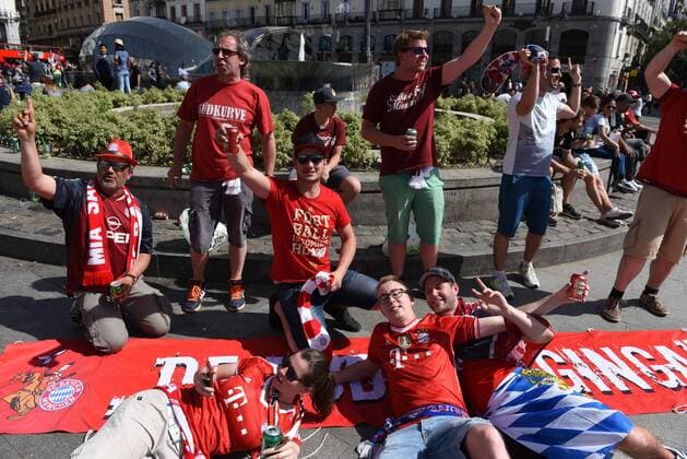 Spain: Bayern Munich supporters in Madrid Nearly 4,200 Bayern fans travel to Madrid to watch the UEFA Champions League quarter-final match between Real Madrid (Spain) and Bayern Munich (Germany). Supporters congregate in Plaza Mayor and Puerta of Sol, in central Madrid.  JorgexSanzx xPacificxPress