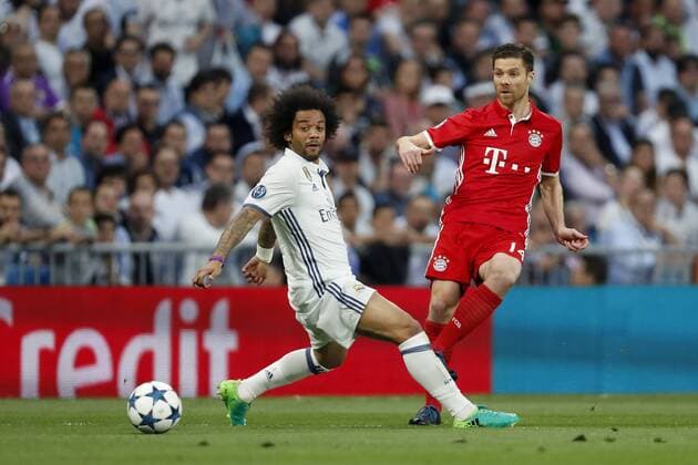 (L-R) Marcelo of Real Madrid, Xabi Alonso of Bayern Munichduring the UEFA Champions League quarter final match between Real Madrid and Bayern Munich on April 18, 2017 at the Santiago Bernabeu stadium in Madrid, Spain Real Madrid v Bayern München UEFA Champions League 2016 2017 xVIxxIVx 7603317