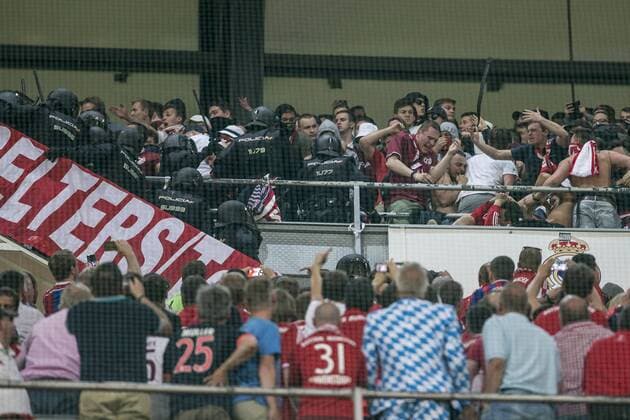 Supporters of FC Bayern Munchen and Spanish police created disturbs during the match of Champions League between Real Madrid and FC Bayern Munchen at Santiago Bernabeu Stadium in Madrid, Spain. April 18, 2017.  (20170418053)