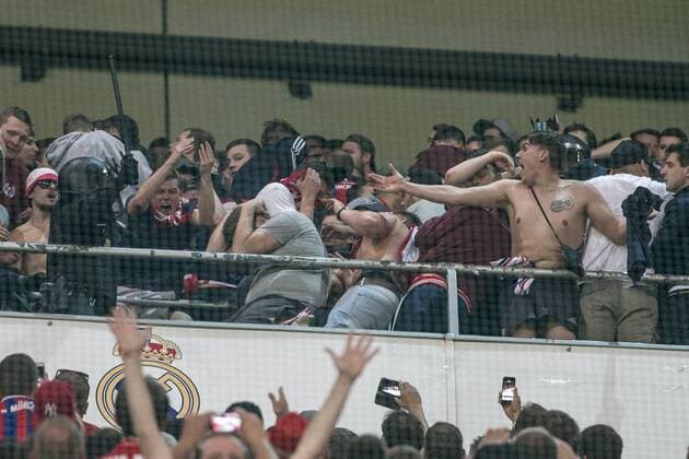 Supporters of FC Bayern Munchen and Spanish police created disturbs during the match of Champions League between Real Madrid and FC Bayern Munchen at Santiago Bernabeu Stadium in Madrid, Spain. April 18, 2017.  (20170418055)