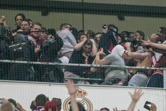 Supporters of FC Bayern Munchen and Spanish police created disturbs during the match of Champions League between Real Madrid and FC Bayern Munchen at Santiago Bernabeu Stadium in Madrid, Spain. April 18, 2017.  (20170418056)