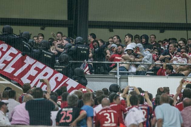 Supporters of FC Bayern Munchen and Spanish police created disturbs during the match of Champions League between Real Madrid and FC Bayern Munchen at Santiago Bernabeu Stadium in Madrid, Spain. April 18, 2017.  (20170418050)