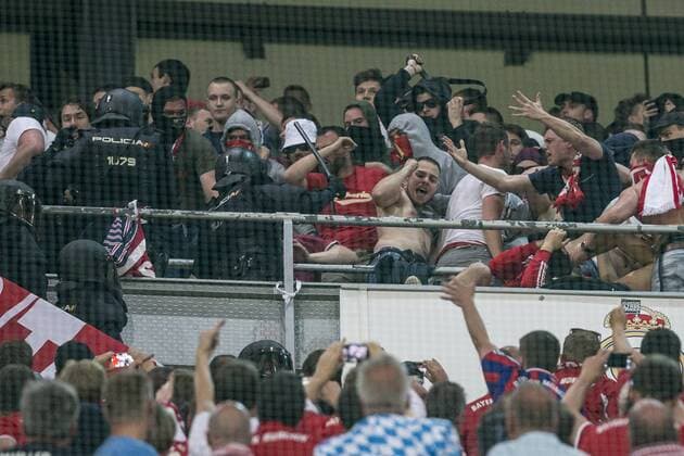 Supporters of FC Bayern Munchen and Spanish police created disturbs during the match of Champions League between Real Madrid and FC Bayern Munchen at Santiago Bernabeu Stadium in Madrid, Spain. April 18, 2017.  (20170418051)
