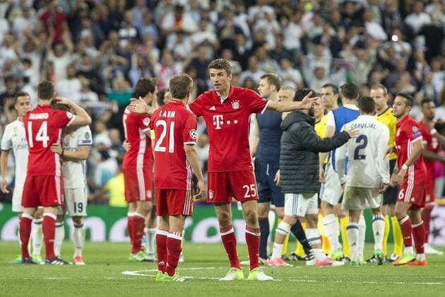 Thomas Muller and Philipp Lahm of FC Bayern Munchen during the match of Champions League between Real Madrid and FC Bayern Munchen at Santiago Bernabeu Stadium in Madrid, Spain. April 18, 2017.  (20170418115)