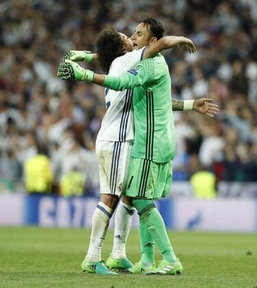 Partido de vuelta de cuartos de final de la Liga de Campeones entre el Real Madrid y el Bayern. En la imagen, Marcelo y Navas. Second leg match of Champions League quarterfinals between Real Madrid and Bayern. In this picture, Marcelo and Navas. xJOSExA.xGARCIAx 