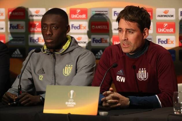 Anderlecht s Dennis Appiah and Anderlecht s head coach Rene Weiler pictured during a press conference PK Pressekonferenz of Belgian soccer team RSC Anderlecht in Manchester, UK, Wednesday 19 April 2017. Tomorrow Anderlecht is playing the return leg game of the quarterfinals of the Europa League competition against UK team Manchester United ManU VIRGINIExLEFOUR  x05083689x