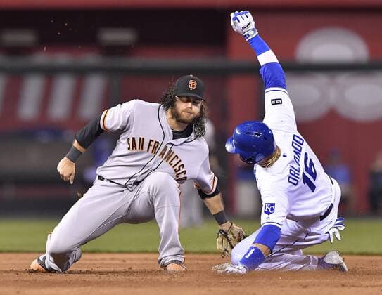 April 19, 2017 - Kansas City, MO, USA - The Kansas City Royals Paulo Orlando, right, steals second before the tag from San Francisco Giants shortstop Brandon Crawford in the fifth inning at Kauffman Stadium in Kansas City, Mo., on Wednesday, April 19, 2017. San Francisco at Kansas City - ZUMAm67_ 20170419_zaf_m67_021 Copyright: xJohnxSleezerx
