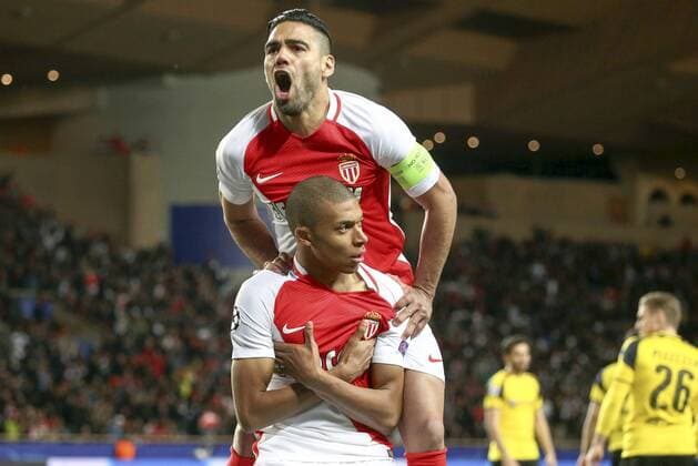 (170420) -- FONTVIEILLE, April 20, 2017 -- Kylian Mbappe (Bottom) and Radamel Falcao of AS Monaco celebrate scoring during the quaterfinal second leg match of UEFA Champions League against Borussia Dortmund in Fontvieille, Monaco on April 19, 2017. Monaco won 3-1 and advanced to the semifinal with 6-3 on aggregate.) (wll) (SP)MONACO-FONTVIEILLE-SOCCER-UEFA-UCL-QUATERFINAL-MONACO VS DORTMUND SergexHaouzi 