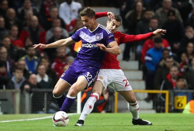 Anderlecht s Leander Dendoncker and Manchester s Henrikh Mkhitaryan fight for the ball during the return leg game of the quarterfinals of the Europa League competition between UK team Manchester United ManU and Belgian soccer team RSC Anderlecht in Manchester, UK, Thursday 20 April 2017. First leg ended on a draw result 1-1 in Belgium. VIRGINIExLEFOUR  x05084079x