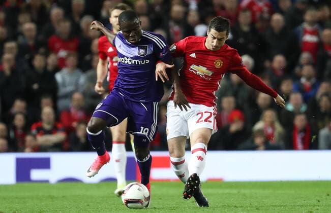 Anderlecht s Frank Acheampong and Manchester s Henrikh Mkhitaryan fight for the ball during the return leg game of the quarterfinals of the Europa League competition between UK team Manchester United ManU and Belgian soccer team RSC Anderlecht in Manchester, UK, Thursday 20 April 2017. First leg ended on a draw result 1-1 in Belgium. VIRGINIExLEFOUR  x05084089x