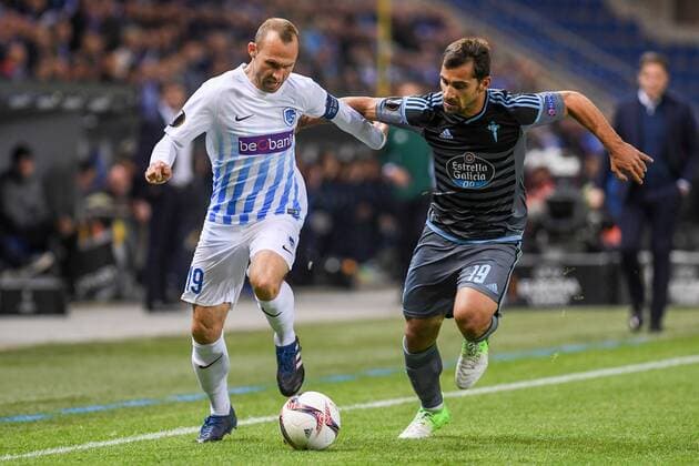 Genk s Thomas Buffel and Celta s Jonny fight for the ball during the return leg of quarterfinals in the Europa League competition between Belgian soccer team RC Genk and Spanish team Celta Vigo, Thursday 20 April 2017, in Genk. First leg ended on a 2-3 result in Spain. LUCxCLAESSEN  x05084098x