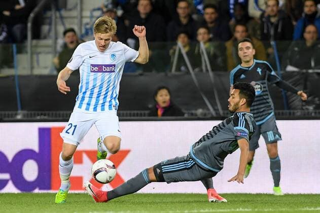 Genk s Jere Uronen and Celta s Gustavo Cabral fight for the ball during the return leg of quarterfinals in the Europa League competition between Belgian soccer team RC Genk and Spanish team Celta Vigo, Thursday 20 April 2017, in Genk. First leg ended on a 2-3 result in Spain. LUCxCLAESSEN  x05084104x