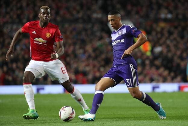 Manchester s Paul Pogba and Anderlecht s Youri Tielemans fight for the ball during the return leg game of the quarterfinals of the Europa League competition between UK team Manchester United ManU and Belgian soccer team RSC Anderlecht in Manchester, UK, Thursday 20 April 2017. First leg ended on a draw result 1-1 in Belgium. VIRGINIExLEFOUR  x05084125x