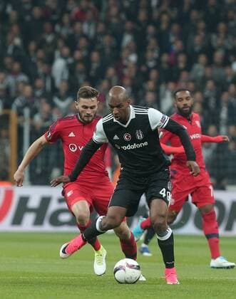 Besiktas s Ryan Babel and Olympique Lyon s Lucas Tousart during UEFA Europa League second leg quarter final football match between Besiktas and Olympique Lyon on April 20, 2017, at the Vodafone arena stadium in Istanbul. (  Copyright: TolgaxAdanali 15675839