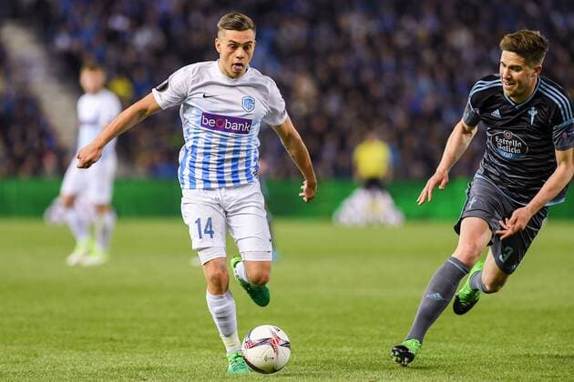 Genk s Leandro Trossard and Celta s Andreu Fontas fight for the ball during the return leg of quarterfinals in the Europa League competition between Belgian soccer team RC Genk and Spanish team Celta Vigo, Thursday 20 April 2017, in Genk. First leg ended on a 2-3 result in Spain. LUCxCLAESSEN  x05084132x