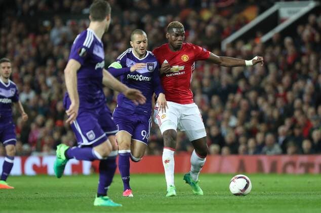 Anderlecht s Sofiane Hanni and Manchester s Paul Pogba fight for the ball during the return leg game of the quarterfinals of the Europa League competition between UK team Manchester United ManU and Belgian soccer team RSC Anderlecht in Manchester, UK, Thursday 20 April 2017. First leg ended on a draw result 1-1 in Belgium. VIRGINIExLEFOUR  x05084142x