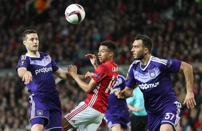 Anderlecht s Uros Spajic, Manchester s Jesse Lingard and Anderlecht s Ivan Obradovic fight for the ball during the return leg game of the quarterfinals of the Europa League competition between UK team Manchester United ManU and Belgian soccer team RSC Anderlecht in Manchester, UK, Thursday 20 April 2017. First leg ended on a draw result 1-1 in Belgium. VIRGINIExLEFOUR  x05084139x