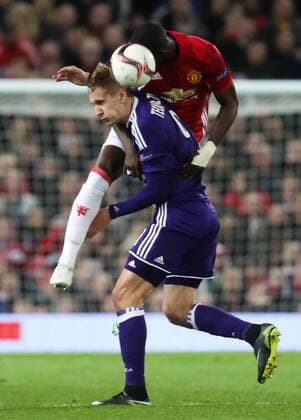 Manchester s Eric Bailly and Anderlecht s Lukasz Teodorczyk fight for the ball during the return leg game of the quarterfinals of the Europa League competition between UK team Manchester United ManU and Belgian soccer team RSC Anderlecht in Manchester, UK, Thursday 20 April 2017. First leg ended on a draw result 1-1 in Belgium. VIRGINIExLEFOUR  x05084147x