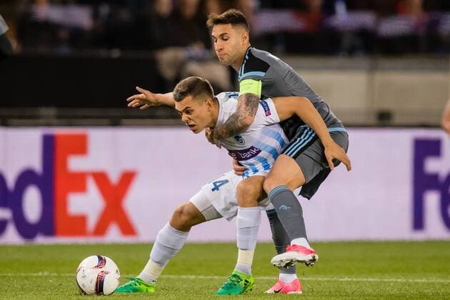 (L-R) Leandro Trossard of KRC Genk, Hugo Mallo of RC Celta de Vigoduring the UEFA Europa League quarter final match between KRC Genk and Celta de Vigo on April 20, 2017 at the Luminus Arena in Genk, Belgium KRC Genk v Celta de Vigo UEFA Europa League 2016 2017 xVIxGerritxvanxKeulenxIVx 7615316