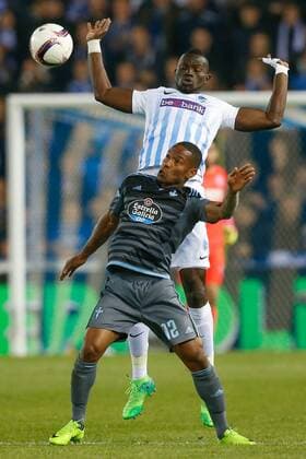 Celta s Claudio Beauvue and Genk s Omar Colley fight for the ball during the return leg of quarterfinals in the Europa League competition between Belgian soccer team RC Genk and Spanish team Celta Vigo, Thursday 20 April 2017, in Genk. First leg ended on a 2-3 result in Spain. BRUNOxFAHY  x05084186x