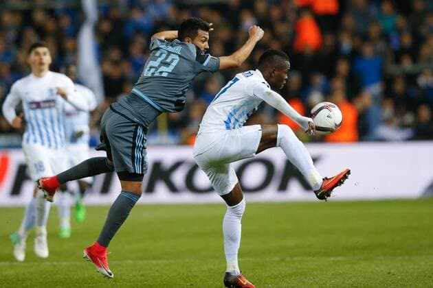 Celta s Gustavo Cabral and Genk s Mwbana Ally Samatta fight for the ball during the return leg of quarterfinals in the Europa League competition between Belgian soccer team RC Genk and Spanish team Celta Vigo, Thursday 20 April 2017, in Genk. First leg ended on a 2-3 result in Spain. BRUNOxFAHY  x05084197x