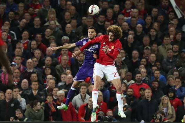 Anderlecht s Ivan Obradovic and Manchester s Marouane Fellaini fight for the ball during the return leg game of the quarterfinals of the Europa League competition between UK team Manchester United ManU and Belgian soccer team RSC Anderlecht in Manchester, UK, Thursday 20 April 2017. First leg ended on a draw result 1-1 in Belgium. VIRGINIExLEFOUR  x05084222x