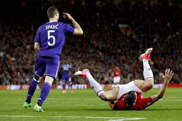 Zlatan Ibrahimovic of Manchester United ManU clashes with Uros Spajic of Anderlecht during the UEFA Europa League Quarter Final 2nd Leg match at Old Trafford, Manchester. Picture date: April 20th, 2017. Pic credit should read: Matt McNulty Sportimage EDITORIAL USE ONLY. No use with unauthorised audio, video, data, fixture lists, club league logos or live services. Online in-match use limited to 120 images, no video emulation. No use in betting, games or single club league player publications.