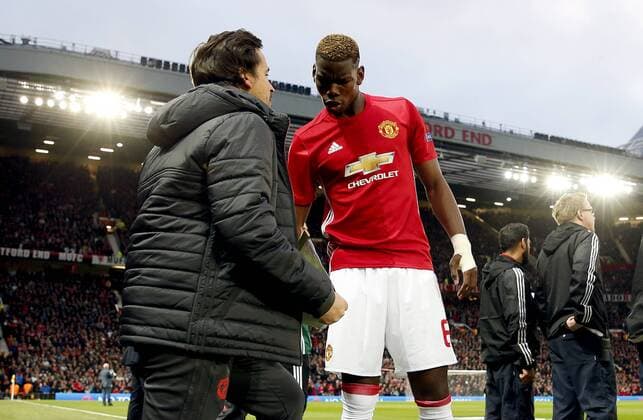 Paul Pogba of Manchester United ManU discusses tactics with coach Rui Faria during the UEFA Europa League Quarter Final 2nd Leg match at Old Trafford, Manchester. Picture date: April 20th, 2017. Pic credit should read: Matt McNulty Sportimage EDITORIAL USE ONLY. No use with unauthorised audio, video, data, fixture lists, club league logos or live services. Online in-match use limited to 120 images, no video emulation. No use in betting, games or single club league player publications.