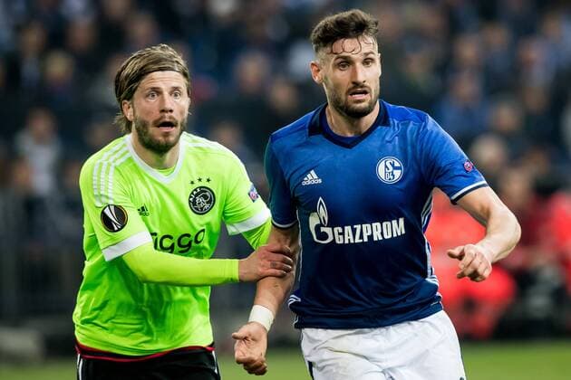 (L-R) Lasse Schone of Ajax, Daniel Caligiuri of FC Schalke 04during the UEFA Europa League quarter final match between Schalke 04 and Ajax Amsterdam on April 20, 2017 at the Veltins-Arena in Gelsenkirchen, Germany. Schalke 04 v Ajax UEFA Europa League 2016 2017 xVIxRonaldxBonestrooxfotografiexIVx 7617674