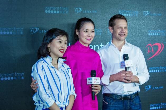 Retired Chinese tennis star Li Na, center, attends the opening ceremony of the restaurant co-opened by her and restaurant brand Element Fresh in Wuhan city, central China s Hubei province, 20 April 2017. Retired tennis star Li Na highlights opening ceremony of restaurant Element Fresh in central China city  pbu610657_18
