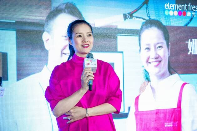 Retired Chinese tennis star Li Na attends the opening ceremony of the restaurant co-opened by her and restaurant brand Element Fresh in Wuhan city, central China s Hubei province, 20 April 2017. Retired tennis star Li Na highlights opening ceremony of restaurant Element Fresh in central China city  pbu610657_02