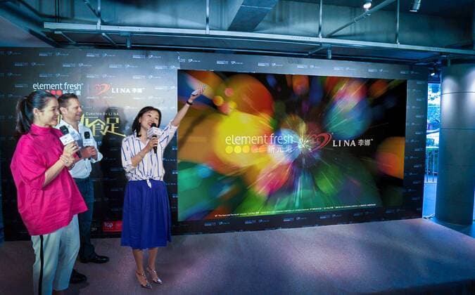 Retired Chinese tennis star Li Na, left, attends the opening ceremony of the restaurant co-opened by her and restaurant brand Element Fresh in Wuhan city, central China s Hubei province, 20 April 2017. Retired tennis star Li Na highlights opening ceremony of restaurant Element Fresh in central China city  pbu610657_03