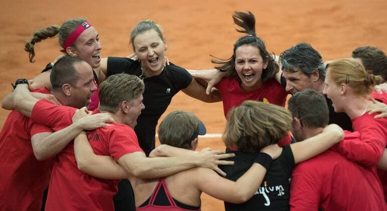 Belgian Elise Mertens, Belgian Maryna Zanevska , Belgium s coach Dominique Monami and Belgian Alison Van Uytvanck celebrate after winning the fifth and last game, the double, between Russian pair Anna Blinkova and Daria Kasatkina and Belgian pair An-Sophie Mestach and Elise Mertens, in the Fed Cup World Group Play Off between Russia and Belgium, Sunday 23 April 2017, at the Small Sports Arena Luzhniki in Moscow, Russia. BENOITxDOPPAGNE  x05086471x