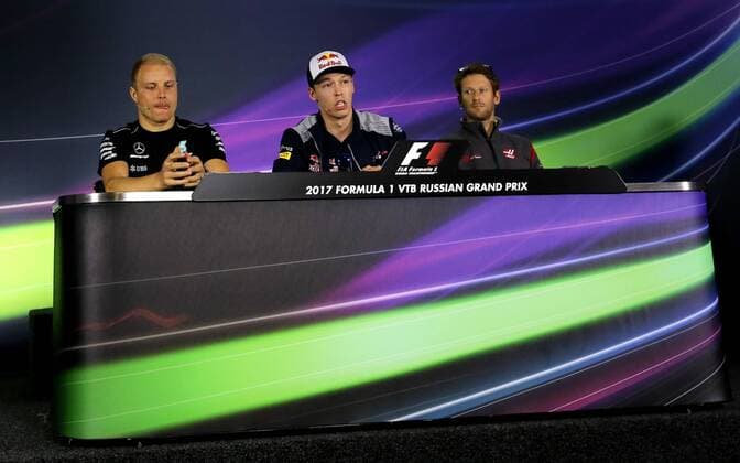 SOCHI, RUSSIA - APRIL 27, 2017: Mercedes Formula One driver Valtteri Bottas of Finland, Toro Rosso Formula One driver Daniil Kvyat of Russia, and Haas Formula One driver Romain Grosjean of France, from left, at a news conference ahead of the 2017 Formula One Russian Grand Prix, at the Sochi Autodrom racing circuit. Alexander Demianchuk TASS  TS049D81