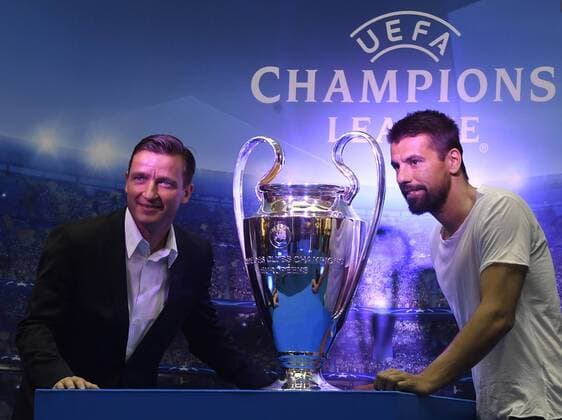 The UEFA Champions League trophy is displayed in Prague, Czech Republic, April 27, 2017. Pictured winners of the Champions League with Liverpool Milan Baros (right) and Vladimir Smicer. (CTKxPhoto MichalxKrumphanzl) CTKPhotoP201704270998001  kru 3