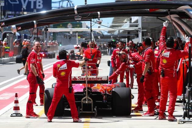 SOCHI, RUSSIA - APRIL 28, 2017: Scuderia Ferrari F1 team mechanics seen during a practice session ahead of the 2017 Formula One VTB Russian Grand Prix at the Sochi Autodrom racing circuit. Vyacheslav Prokofyev TASS  TS049FD7