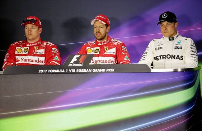 ATTENTION EDITORS! IN PHOTO TS04A283 DATED APRIL 29, 2016 THE CAPTION INCORRECTLY NAMED THE PHOTOGRAPHER. THE CORRECTED CAPTION FOLLOWS: SOCHI, RUSSIA - APRIL 29, 2017: Mercedes AMG Petronas F1 driver Valtteri Bottas of Finland, Scuderia Ferrari F1 drivers Sebastian Vettel of Germany and Kimi Raikkonen of Finland, from right, give a news conference after a qualifying session for the 2017 Formula One Russian Grand Prix at the Sochi Autodrom racing circuit. Alexander Demianchuk TASS WE REGRAT ANY INCONVENIENCE  X0000CE8