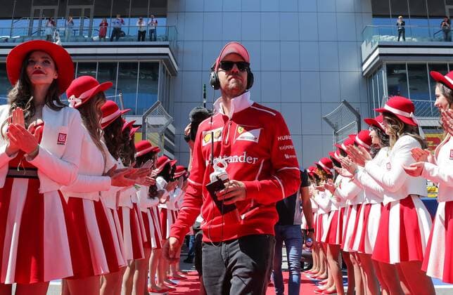 SOCHI, RUSSIA - APRIL 30, 2017: Scuderia Ferrari F1 Team driver Sebastian Vettel (C) of Germany seen during a drivers track parade ahead of the 2017 Formula One Russian Grand Prix at the Sochi Autodrom racing circuit. Vyacheslav Prokofyev TASS  TS04A367