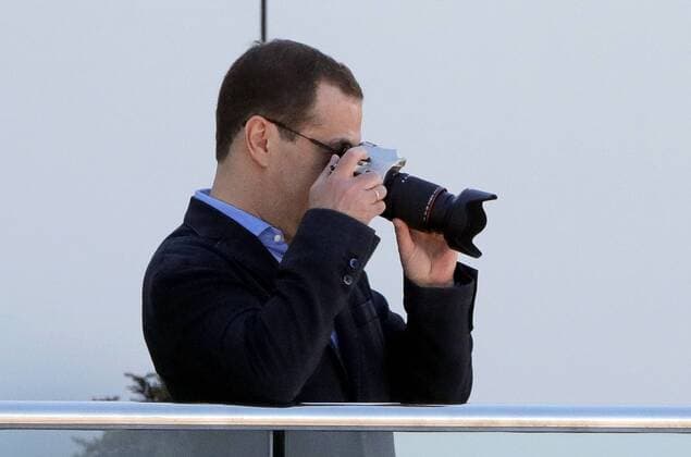 SOCHI, RUSSIA - APRIL 30, 2017: Russia s Prime Minister Dmitry Medvedev watches the 2017 Formula One Russian Grand Prix at the Sochi Autodrom racing circuit. Mikhail Metzel TASS  TS04A376