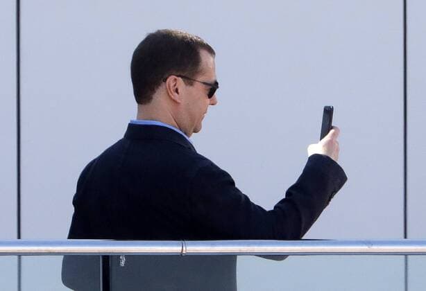 SOCHI, RUSSIA - APRIL 30, 2017: Russia s Prime Minister Dmitry Medvedev watches the 2017 Formula One Russian Grand Prix at the Sochi Autodrom racing circuit. Mikhail Metzel TASS  TS04A386