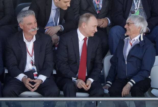 SOCHI, RUSSIA - APRIL 30, 2017: Formula One Group Executive Chairman Chase Carey, Russia s President Vladimir Putin, and Formula One Group Chairman Emeritus Bernard Charles Bernie Ecclestone, from left, watch the 2017 Formula One Russian Grand Prix at the Sochi Autodrom racing circuit. Mikhail Metzel TASS  TS04A38F