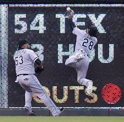 May 1, 2017 - Kansas City, MO, USA - Chicago White Sox center fielder Leury Garcia and starting pitcher Miguel Gonzalez try to catch a double against the wall by Kansas City Royals Alcides Escobar in the third inning on Monday, May 1, 2017 at Kauffman Stadium in Kansas City, Mo. Chicago White Sox vs. Kansas City Royals - ZUMAm67_ 20170501_zaf_m67_041 Copyright: xJohnxSleezerx