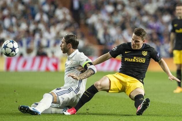 Sergio Ramos of Real Madrid competes for the ball with Kevin Gameiro of Atletico de Madrid during the match of Champions League between Real Madrid and Atletico de Madrid at Santiago Bernabeu Stadium in Madrid, Spain. May 02, 2017.  (20170502057)