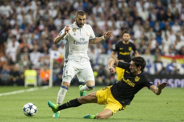 Karim Benzema of Real Madrid competes for the ball with Stefan Savic of Atletico de Madrid during the match of Champions League between Real Madrid and Atletico de Madrid at Santiago Bernabeu Stadium in Madrid, Spain. May 02, 2017.  (20170502055)